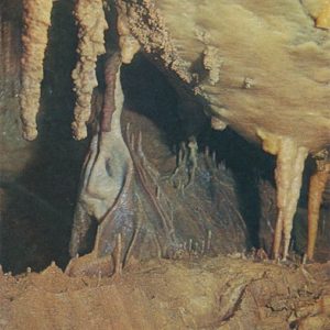 Stalactite curtains and draperies. New Athos Cave, 1980